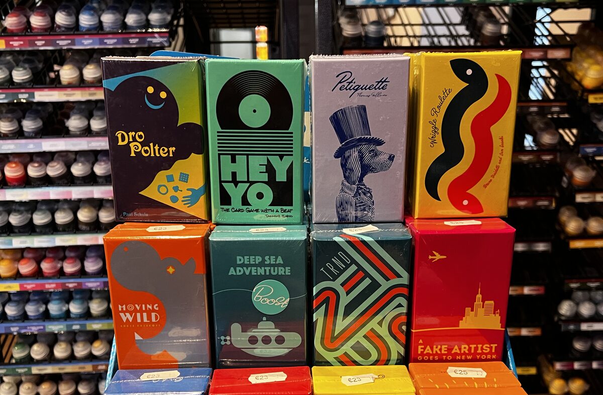 A colourful display of Oink Games titles at the Board & Brewed shop